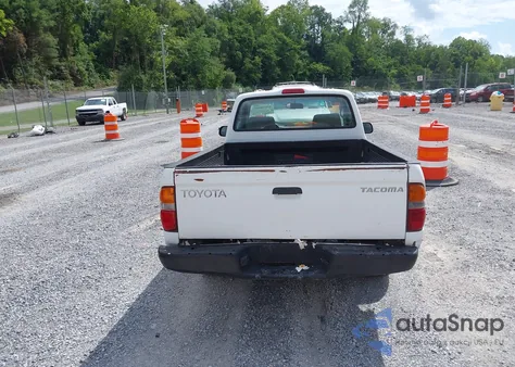 2001 Toyota Tacoma из США, поврежденный, VIN 5TENL42N51Z738603